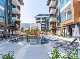 Silece garden suite iki yatak odalı daire, hotel com banheiras de hidromassagem em Alanya