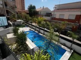 Air-conditioned Elisa Apartment with spacious sunroof lounge and swimming pool