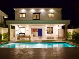Villa Antonia Spectacular Private Stay with Pool, Just Steps from the Beach, Housekeeping & Kitchen in Exclusive Gated Community