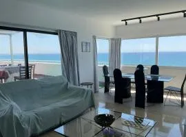 Stunning Top-Floor Beachfront Apartment