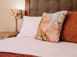 Bellerose Guesthouse, отель с парковкой в городе Клерксдорп