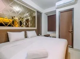 Warm and Minimalist Studio Room Transpark Cibubur Apartment By Travelio