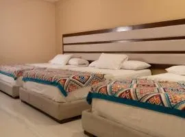 Infinity Suites Habitación Triple 211