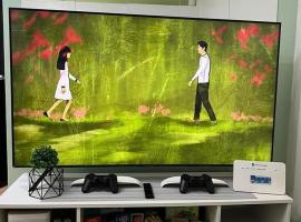 Condo in Marilao with Free Videoke, acomoda&ccedil;&atilde;o em condom&iacute;nio em Marilao