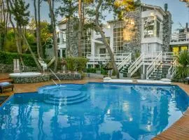 Runa Moraira Apart & Spa、マール・デ・ラス・パンパスのビーチ周辺のバケーションレンタル