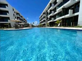 Flat em Muro Alto Porto de Galinhas com Piscina, Ar-condicionado e Cozinha Equipada