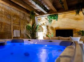 Suite troglodyte & spa privé - Luxe et détente, hotel in Doué-la-Fontaine