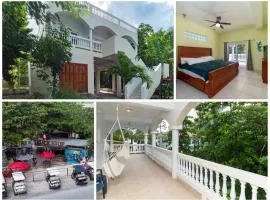 Casa Alegre- Heart of Tres Cocos Area across from Truck Stop by Stay Floreo