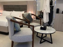 شاليهات قولد الفندقية，位于塔伊夫的木屋