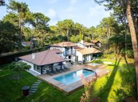 Villa de luxe avec piscine chauffée, jacuzzi, sauna au cœur de la forêt des Landes - FR-1-791-24