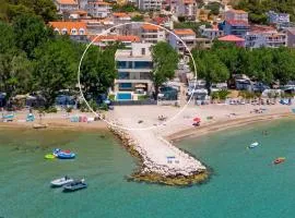 Beachfront Villa Erce with private 40sqm heated pool, a Gym, 7 en-suite bedrooms, a rooftop terrace, 2 living areas