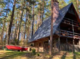 Ferienhaus Marianna am See mit gratis Sauna, Ruderboot, Kajak & WLAN, hotel v destinaci Krzywonoga