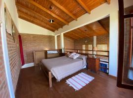 Eluney con piscina Duplexs, hotel i Mina Clavero