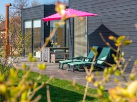 Sterrenkijker - Ecohuisjes Terschelling, villa en Midsland