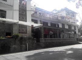 Xiaohong Guesthouse, hotel v Enshi