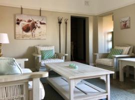 Kingfisher Cottage، فندق في أومكوماس