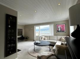 Hjem i Tromsø, villa en Tomasjorda