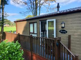 Thistle Lodge, hotel i Dollar