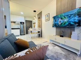 1 BedroomDeLuxe Condo w/Balcony, Pool & Gym, acomoda&ccedil;&atilde;o em condom&iacute;nio em Puerto Princesa