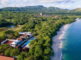 Spacious 4BR Condo with Partial Ocean View - Bougainvillea - Reserva Conchal, hotel di Playa Conchal
