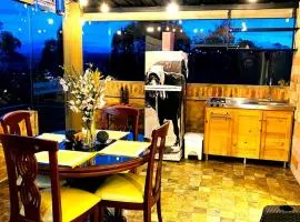 Romántica Cabaña con vista a la ciudad, 10 min del Centro