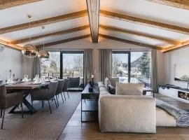 Genießen Sie Bergblick & Sauna im modernen Chalet