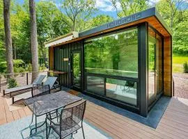 Modern Riverside Cabin w Hot Tub Fire Pit Kayaks