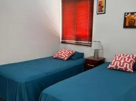 Tu Hogar Encantado Casa Entera con dos Habitaciones