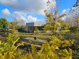 La Maison Fleurie - Sunny holiday home with large garden, parking, within walking distance of the sea