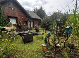 Chalet du champs des semeaux, Hotel in Wisches