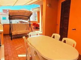CASA VACANZE trilocale con grande terrazza veranda