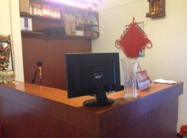 Yixin Business Hotel, hotel en Shaping