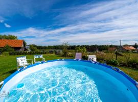 Zacisze Rostken, Wypoczynek na Mazurach, Dom Całoroczny z Prywatną Plażą, hótel í Ostrów