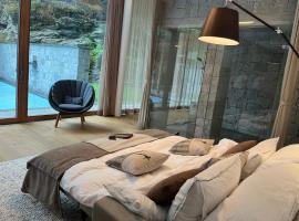 Luxus-Mountain-Suite Rocca Bella mit Dampfbad & saisonalem Aussen-Pool, place to stay in Flims