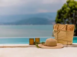 BEACHSIDE VILLA - VESPA - 3 BDR VILLA plus 1 BDR APARTMENT at SUNSET COVE BAY with SEA and MOUNTAIN VIEWS, 100 meters to the Swimming Beach