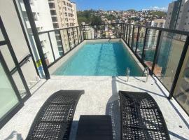 Studio aconchegante no centro, hótel í Poços de Caldas