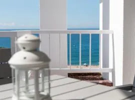 SeaHomes Vacations - Seafront Apt Fenals with PKG