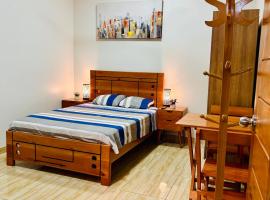 Habitación Céntrica en Iquitos - Casa Alemi, δωμάτιο σε οικογενειακή κατοικία σε Iquitos