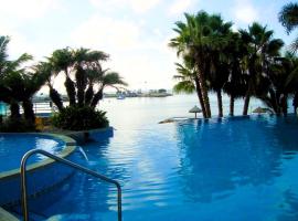 Apartamento de Lujo con playa privada Condominio Torre Marina, hotel in Salinas