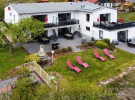 Ferienwohnung 5 mit Ostseeblick am Breitling, hôtel à Malchow