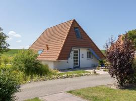 Ferienhaus "Greifenberg" Hans Albers 17, hotel in Wremen