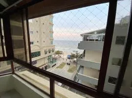 Cobertura quadra mar
