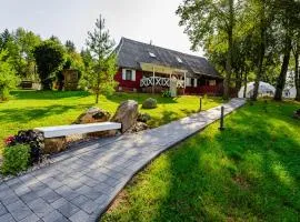 Namas su vaizdu į ežerą "Giliaus Nendrė"