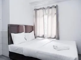Nice and Simply 2BR at Green Bay Pluit Apartment By Travelio