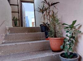 Unique apartment, hotel con estacionamiento en Shibīn al Kawm