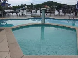 Casa Duplex com 02 suites completa em Condomínio com Piscina , Sauna , churrasqueiras, deck podendo parar embarcações, próximo as Praias das Conchas e Peró e também linda Ilha do Japônes