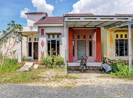 Hotel O Kost Axcel，位于Sungai Lutus马辰国际机场 - BDJ附近的酒店