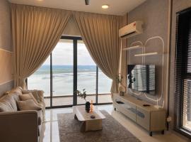Cozy Beachfront Seaview with 2 CarParks FOC Netflix Access and YouTube Premium 3Beds3Bath 6-11pax by Minshuku, hotel dengan tab panas di Johor Bahru