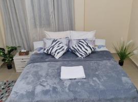 Cozy Private Rooms in Central Shabia 12, Free Wi-Fi & Kitchen Access