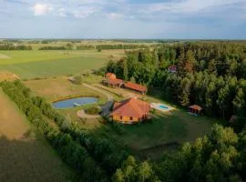 Dworek Ogrodniki, całoroczny dom na wyłączność, basen, sauna, las, staw rybny, altana grillowa, ognisko, pianino, kominek, piec chlebowy, duża ogrodzona posesja